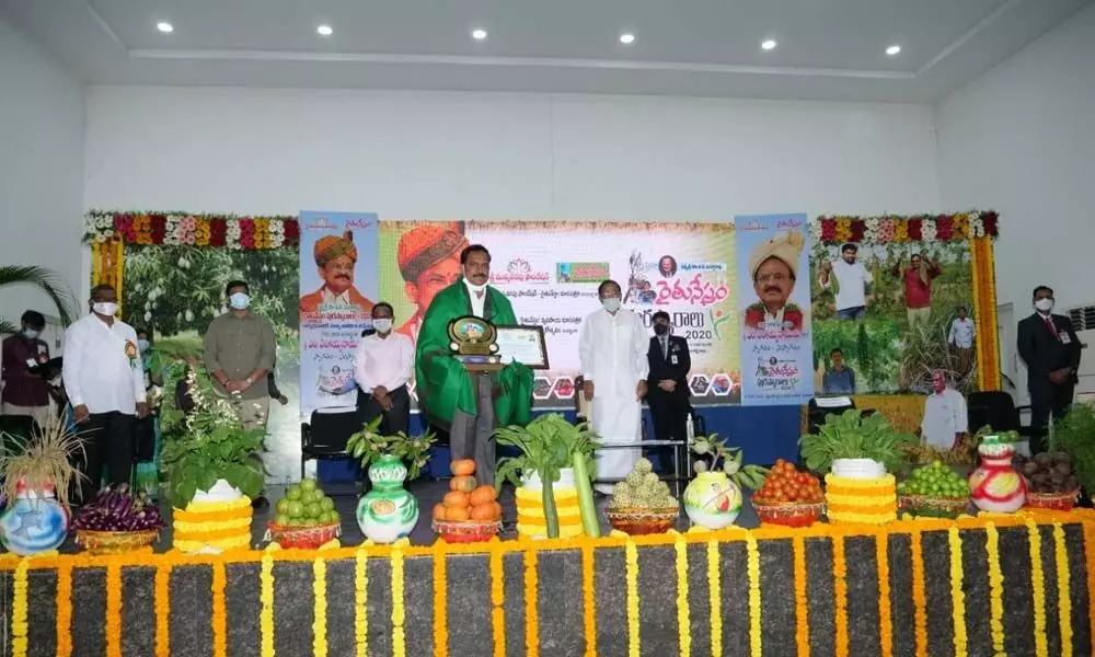 Gruha Vignan scientist Lakshmi Priya receiving Rythu Nestam award from the hands of Vice-President M Venkaiah Naidu in Hyderabad on Wednesday