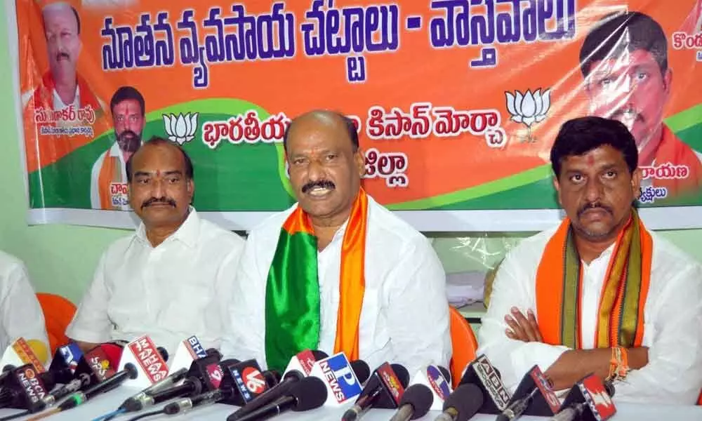 BJP Kisan Morcha central committee general secretary P Sugunakar Rao speaking to the media at party office in Khammam on Wednesday