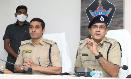 Guntur Range DIG CM Trivikram Varma addressing media on Wednesday. Rural SP Vishal Gunni also seen