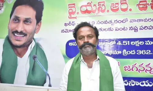 Farmer Pakirappa of Dharmavaram mandal speaking on crop insurance scheme in Anantapur on Wednesday