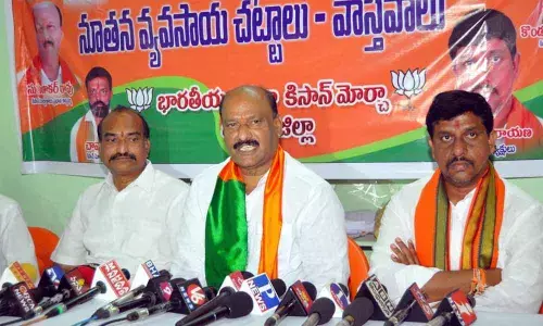 BJP Kisan Morcha central committee general secretary P Sugunakar Rao speaking to the media at party office in Khammam on Wednesday
