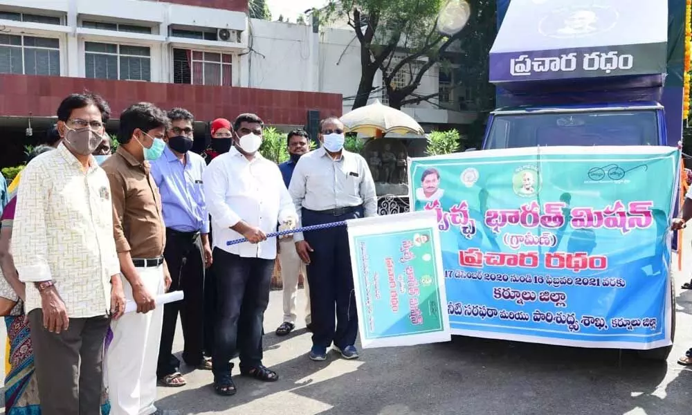 District collector G Veera Pandiyan flagging off a campaigning vehicle from collectorate in Kurnool on Thursday