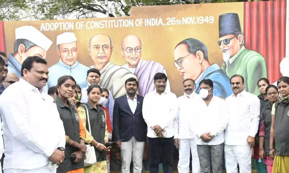 Paintings of Constituent Assembly members and B R Ambedkar being unveiled by Chairman of AP Legislative Committee on scheduled castes Golla Baburao at the fire station in Anantapur on Thursday