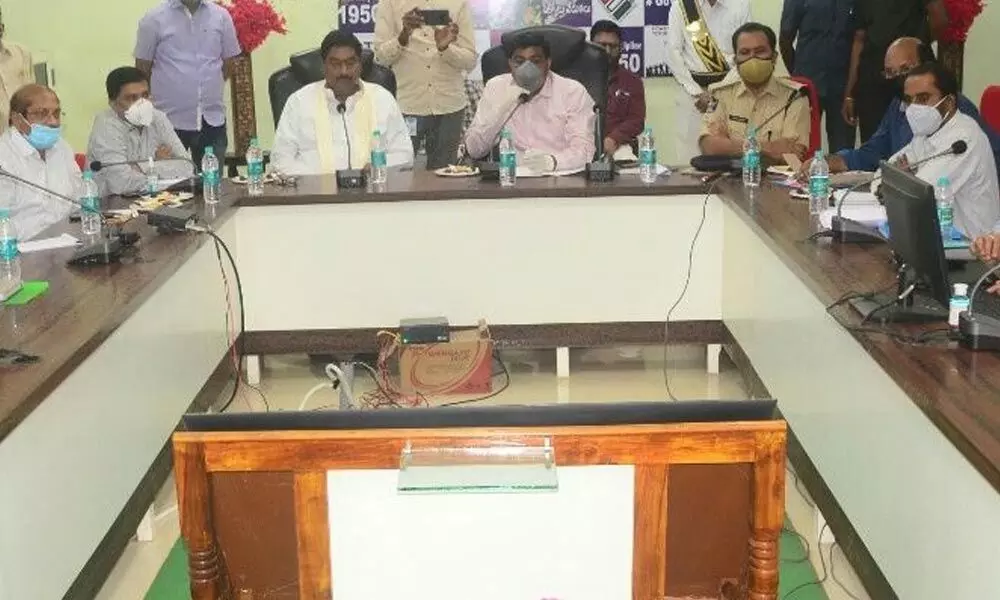 MLA Dharmana Prasada Rao and District Collector J Nivas holding a meeting with officials on beautification of Srikakulam city on Friday