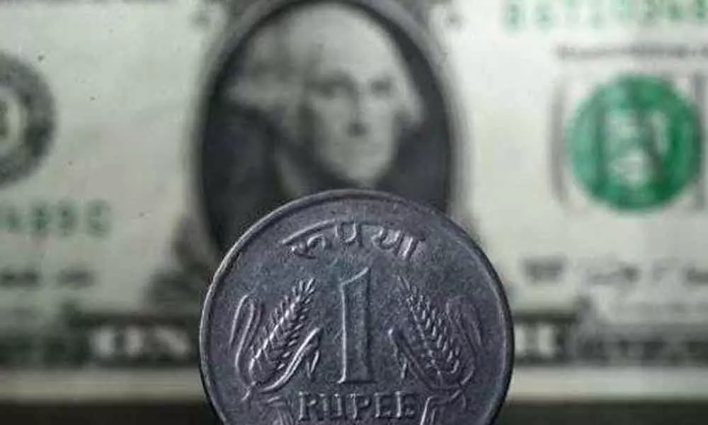 Rupee settles higher at 73.56 against $