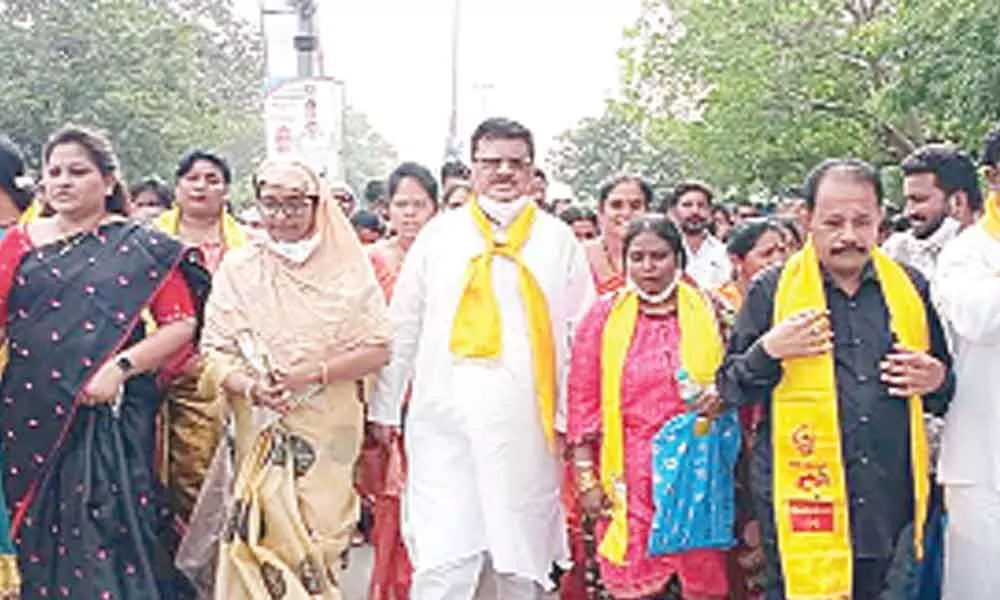 TDP activists take out a rally demanding the arrest of real culprits involved in Lingala incident