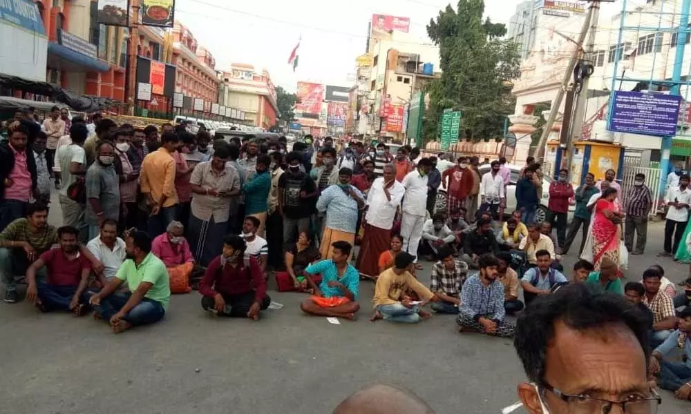Pilgrims staging dharna demanding TTD to provide darshan to SSD token holders on Monday, in Tirupati on Sunday
