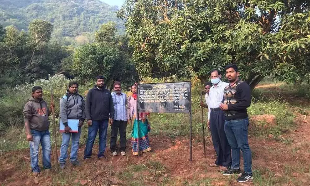Warning board set up at Anakapalle former MLA Peela Govind Satyanarayana’s land in Visakhapatnam on Sunday