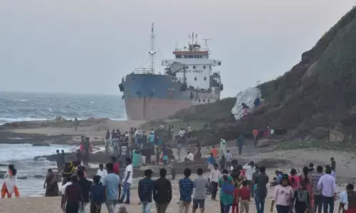 People visiting the MV Maa Bangladeshi vessel that got drifted ashore at Tenneti Park in Visakhapatnam