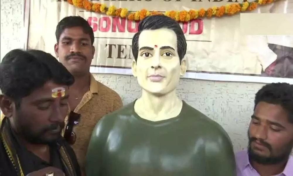 Locals people of Dubba Tanda village in Siddipet district erected actor Sonu Sood statue and performed pooja recognizing the actors humanitarian works.