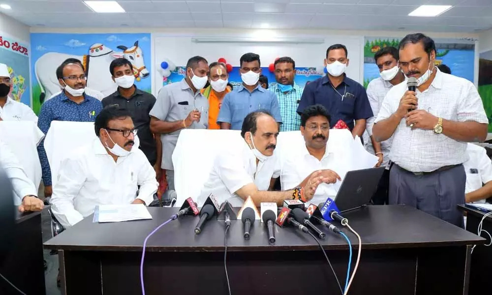 Ministers Balineni Srinivasa Reddy, Audimulapu Suresh releasing the Amma Vodi beneficiaries list online at Ongole on Monday evening