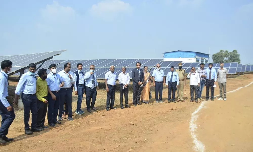 Airports Authority of India Southern Region ED R Madhav and airport director MK Nayak at newly inaugurated solar power project at airport in Rajamahendravaram on Sunday