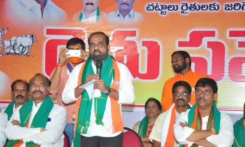 BJP national secretary B Satya Kumar speaking at a seminar organised for the farmers in Khammam on Monday