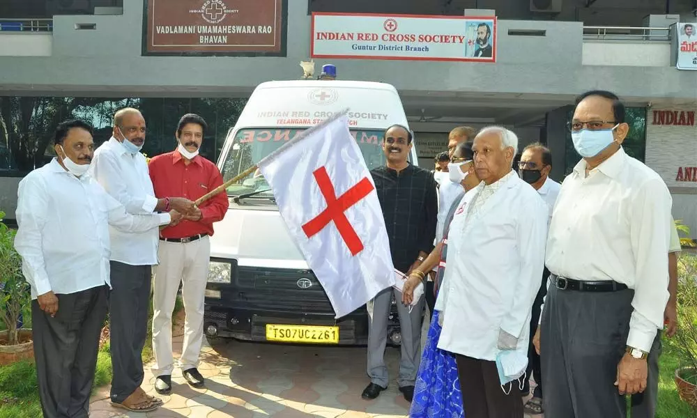 Red Cross AP Chairman Dr A Sridhar Reddy flagging off vehicle to send blood to Telangana