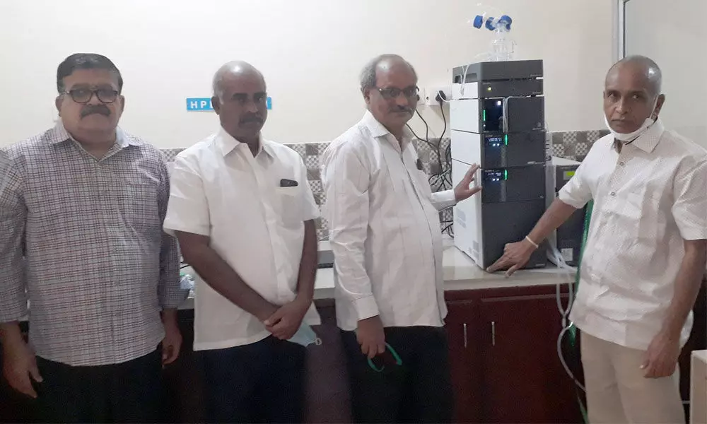 SRKR Engineering College secretary and correspondent Sagi Vithal Ranga Raju and principal Dr M Jagapati Raju inaugurating the HPLC equipment on the campus in Bhimavaram on Thursday