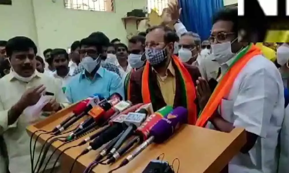Makkal Needhi Maiam leader A. Arunachalam joins Bharatiya Janata Party in the presence of Union Minister and BJP leader Prakash Javadekar