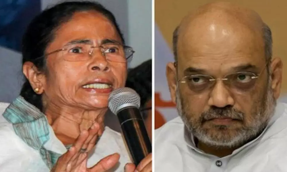 Mamata Banerjee and  Amit Shah