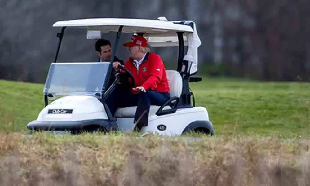 Trump golfs in Florida as COVID relief hangs in the balance (Photo/AP)