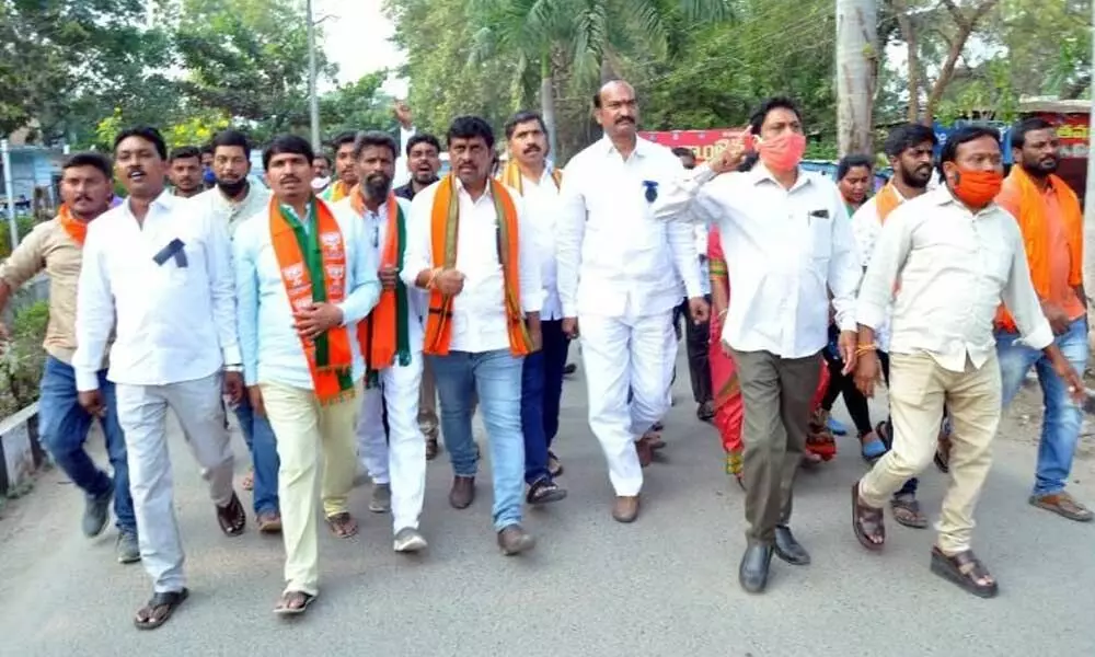 BJP leaders conducting protest at Wyra town on Sunday demanding justice for senior leader Rama Rao’s family