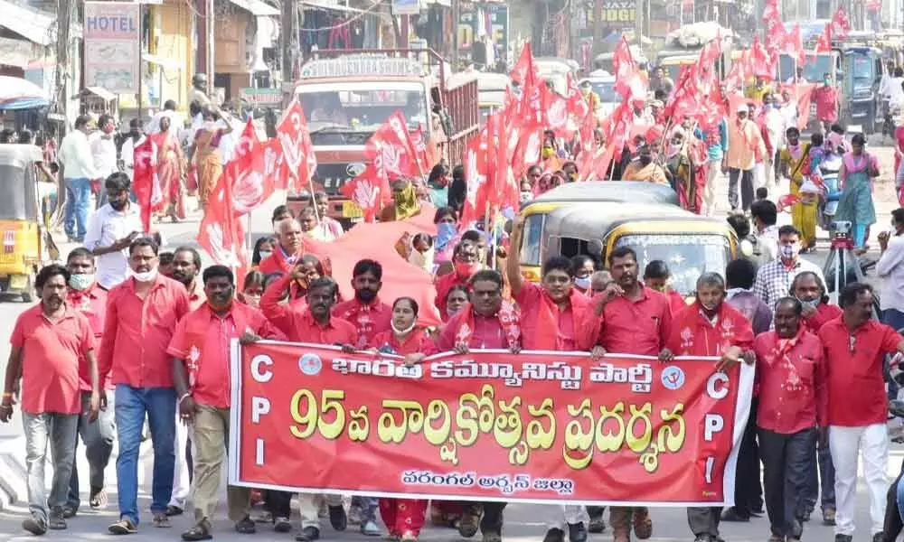 CPI workers taking out a rally on the occasion of the party’s Formation Day in Warangal on Saturday