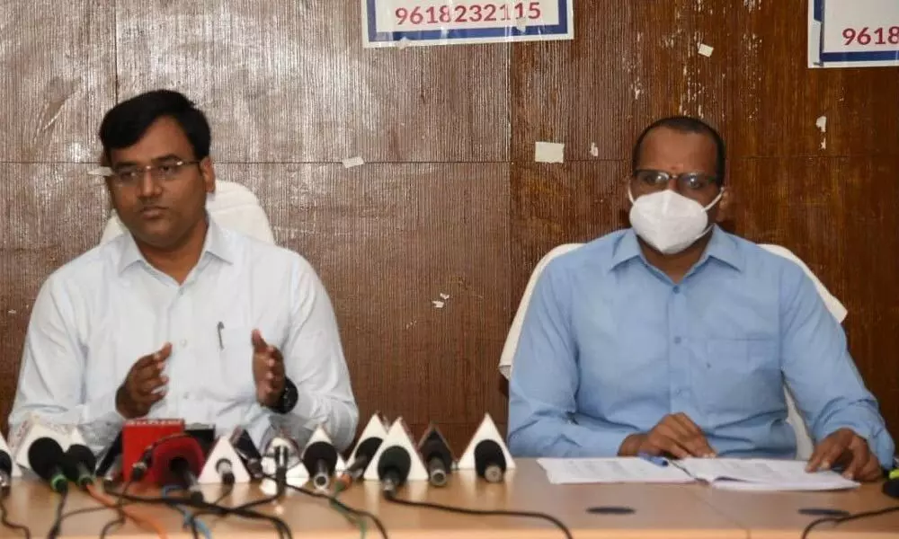 District Collector K V N Chakradhara Babu addressing media in Nellore on Sunday. Joint collector M N Harendira Prasad is also seen