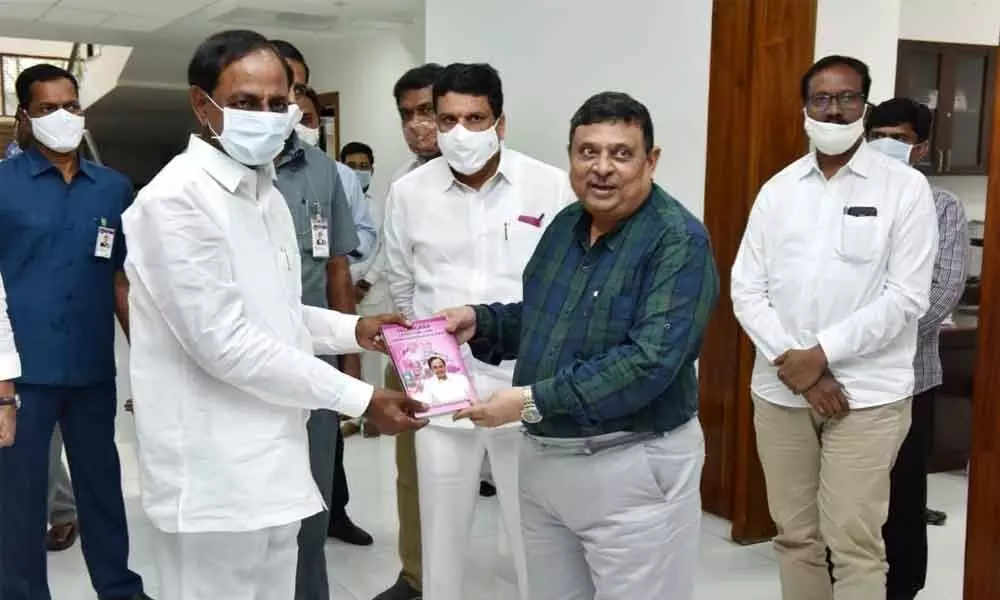 Jwala Narasimha Rao presents copies of his books to CM KCR