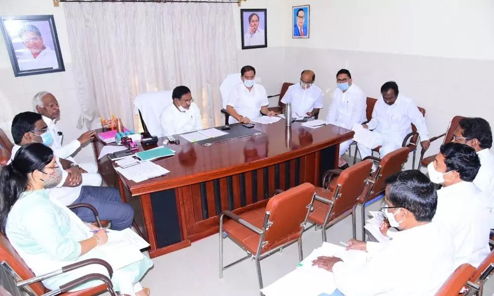 Minister for Panchayat Raj Errabelli Dayakar Rao conducting a review meeting in Warangal on Sunday
