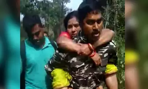 AR constable Shaik Arshad was seen carrying Nageswaramma on his back in dense forest of Seshachalam hills (file photo)