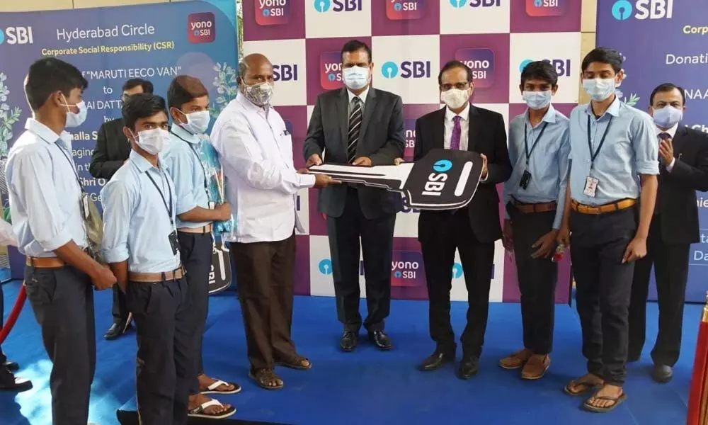 SBI donates vans to city orphanages