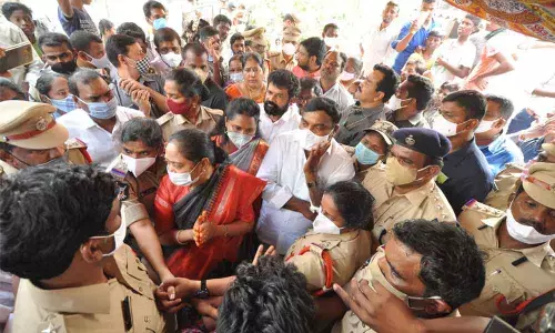 Home Minister M Sucharita at Velagapudi village on Monday