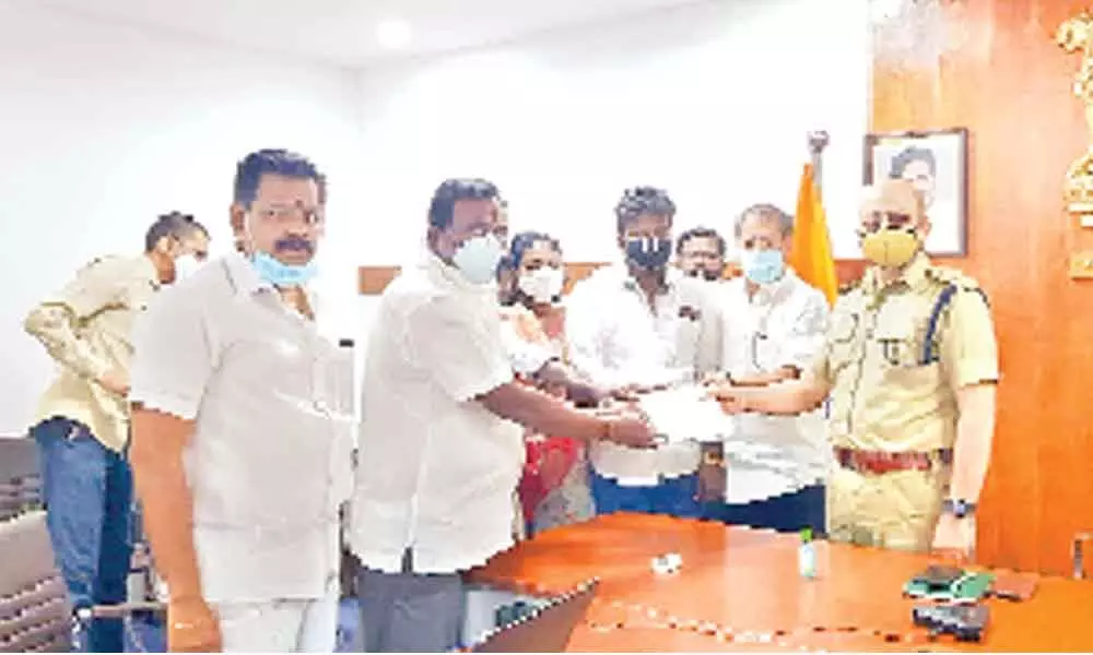 Jana Sena leader Pantham Venkateswara Rao (Nanaji) and others submitting representation to Superintendent of Police Adnan Nayeem Asmi in Kakinada on Tuesday