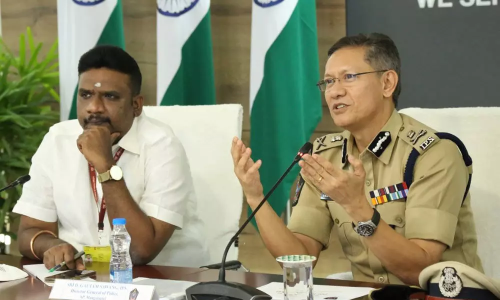 National Child Rights Protection Commission Member Dr RG Anand and State DGP D Gautam Sawang participating in videoconference at State Police Office in Mangalagiri on Tuesday