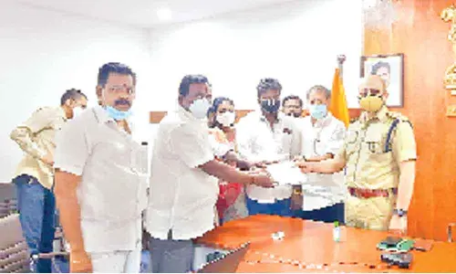 Jana Sena leader Pantham Venkateswara Rao (Nanaji) and others submitting representation to Superintendent of Police Adnan Nayeem Asmi in Kakinada on Tuesday