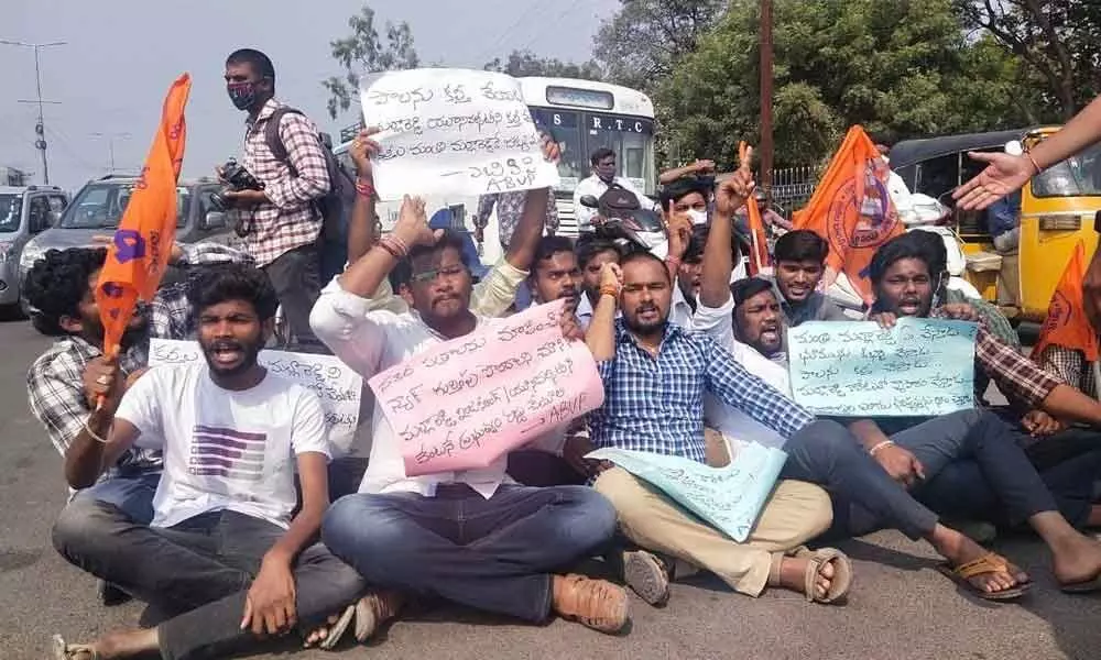 ABVP members staging a protest at KU crossroads in Warangal on Wednesday