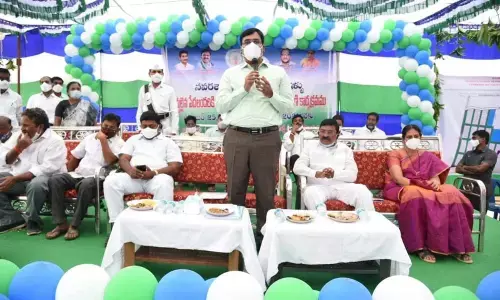 District Collector K V N Chakradhar Babu addressing a meeting in Vinjamuru on Thursday. MLA M Chandrasekhar Reddy is also seen.