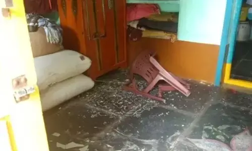 The house ransacked by the parents of eloped girl at Binigeri village in Aspari mandal on Thursday.