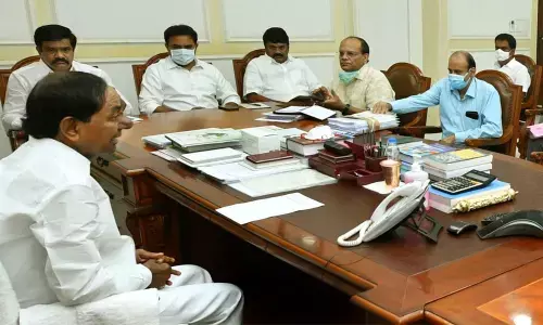 Chief Minister K Chandrashekar Rao holding a review meeting on the maintenance of the Dharani portal at Pragati Bhavan on Thursday