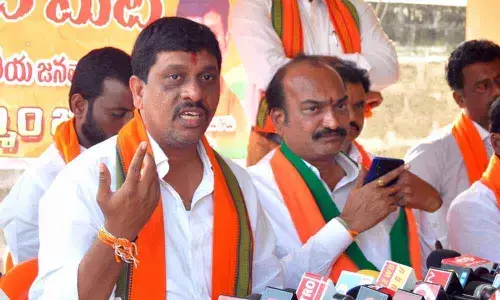 BJP leaders Galla Satyanarayana and Kondapalli Sridhar Reddy speaking to the media people at party office in Khammam