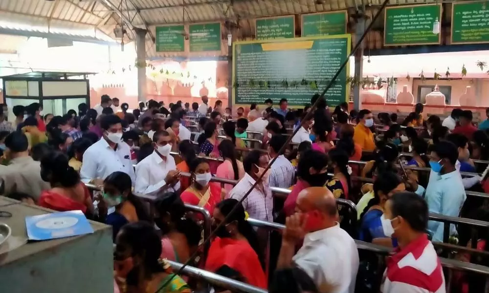 Devotees waiting in queue lines at Sri Kanaka Mahalakshmi (SKML) temple in Visakhapatnam on Friday