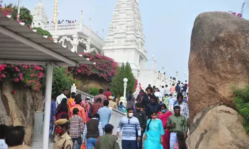 On the first day of New Year devotees are in ‘Q’ to offer prayers in Birla Mandir on Friday.	Photo: Srinivas Setty