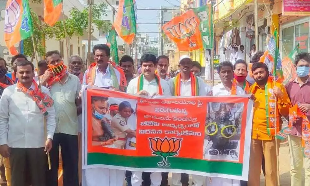 BJP activists taking out a rally in Singarayakonda in Prakasam district on Saturday