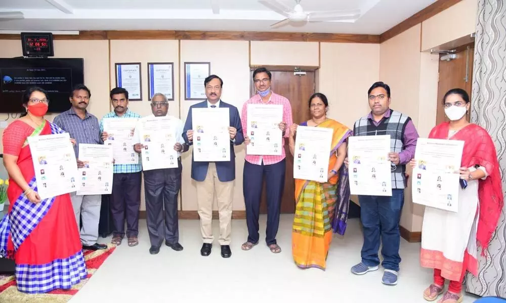 Adikavi Nannaya University Vice-Chancellor Prof Mokka Jagannadha Rao releasing a brochure on campus placement drive in Rajamahendravaram on Monday