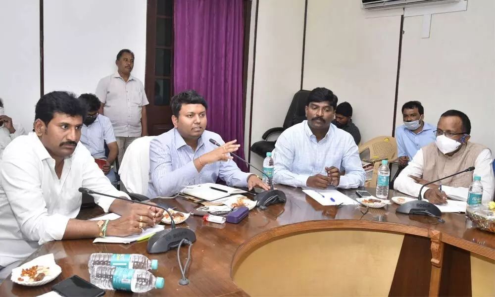 Joint Collector Nishanth addressing a meeting of food processing industry stakeholders in Anantapur on Tuesday. MP Talari Rangaiah and others are seen.