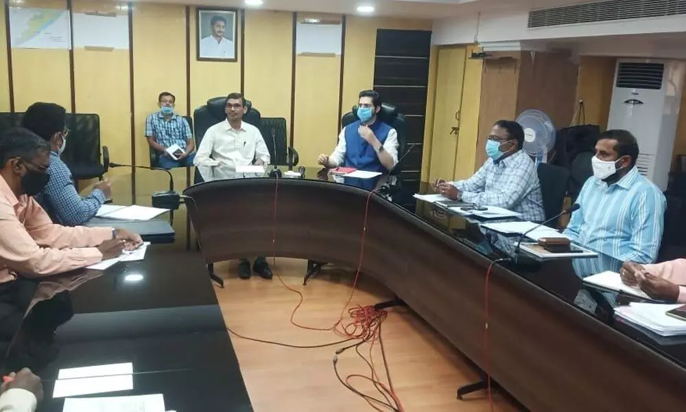 VMRDA Commissioner P Koteswara Rao addressing the officials at a meeting in Visakhapatnam on Tuesday
