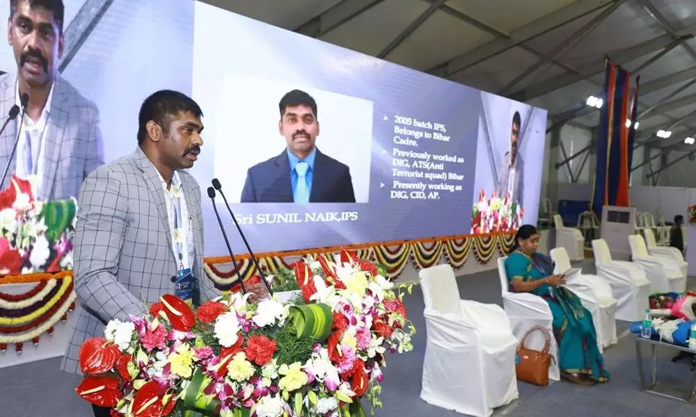 CID DIG Sunil Naik addressing the State Police Duty Meet about online loan frauds in Tirupati on Tuesday