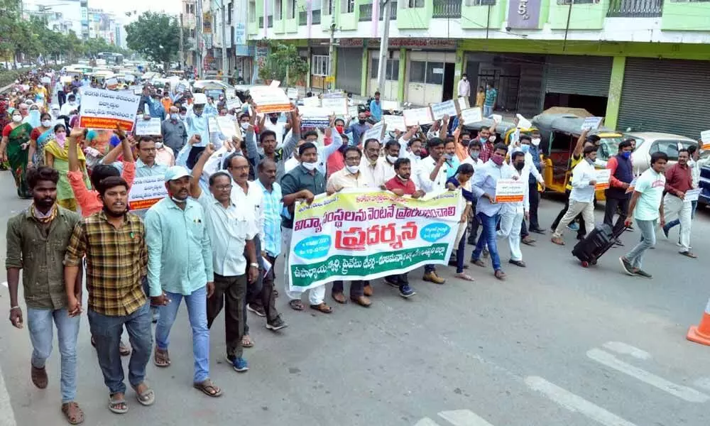 Members of student organisations, private teacher associations and other unions taking out a rally in Khammam town on Wednesday