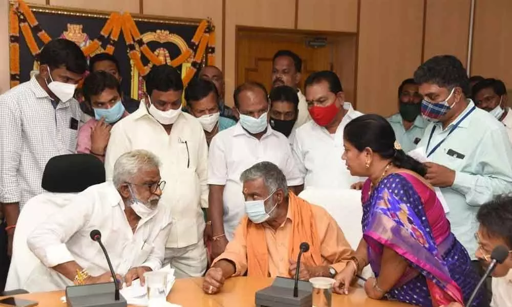 TTD chairman Y V Subba Reddy speaking to Minister for Panchayat Raj and Rural  Development Peddireddy Ramachandra Reddy at a meeting in Tirupati on Wednesday