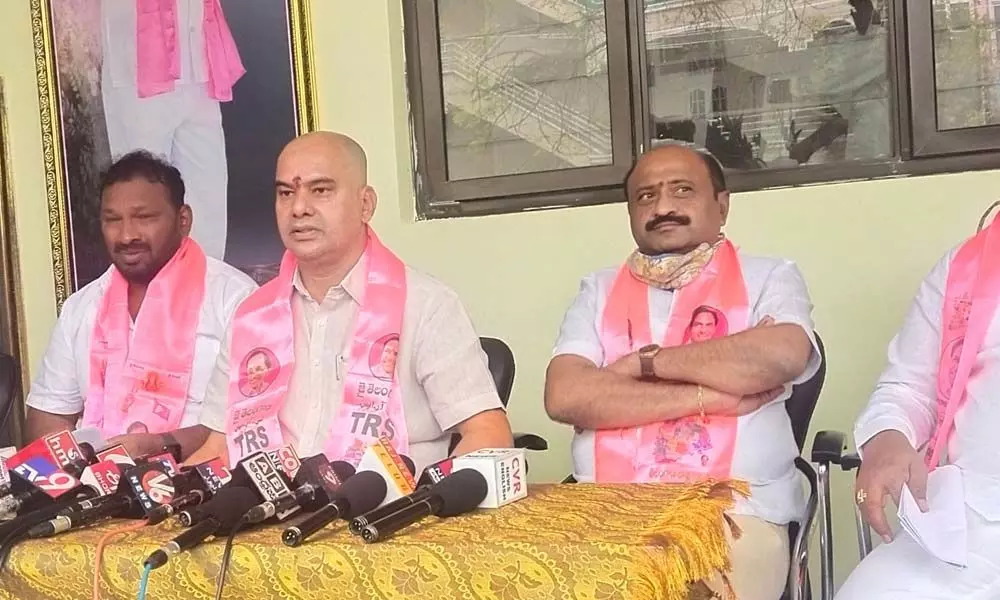 Chief Whip D Vinay Bhaskar (centre) speaking to the media persons at his camp office in Hanamkonda on Wednesday