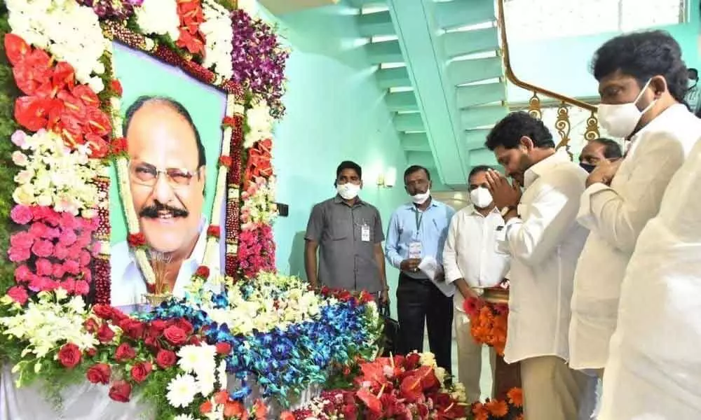 Chief Minister  Y S Jagan Mohan Reddy paying tributes to the portrait of deceased MLC Challa Ramakrishna Reddy at Owk village in Kurnool district on Wednesday