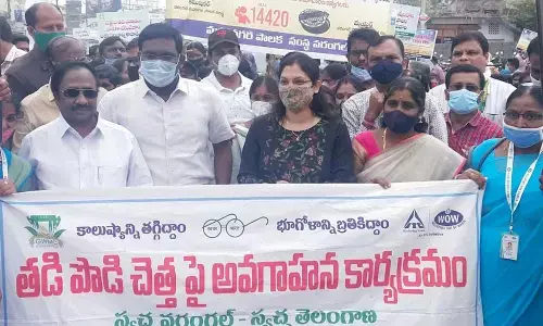 Mayor Gunda Prakash Rao, Urban District Collector Rajiv Gandhi Hanumanthu and Municipal Commissioner Pamela Satpathy participating in an awareness rally on sanitation in Warangal on Wednesday